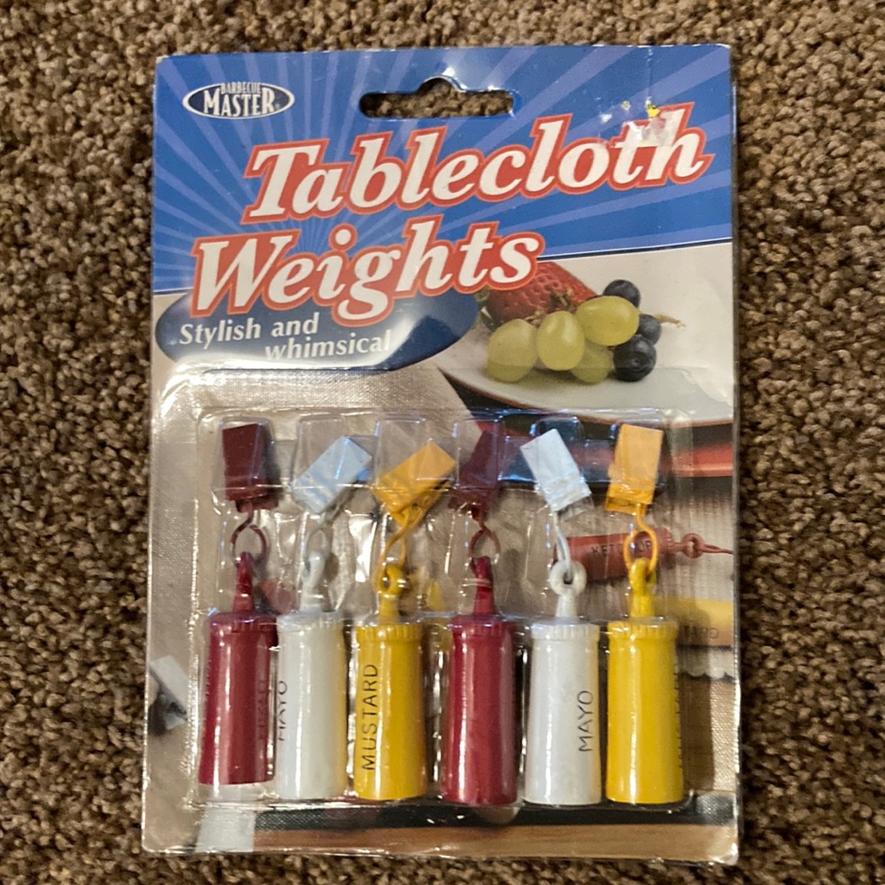 Table cloth weights made by barbecue master. Stylish & whimsical. Total of six.